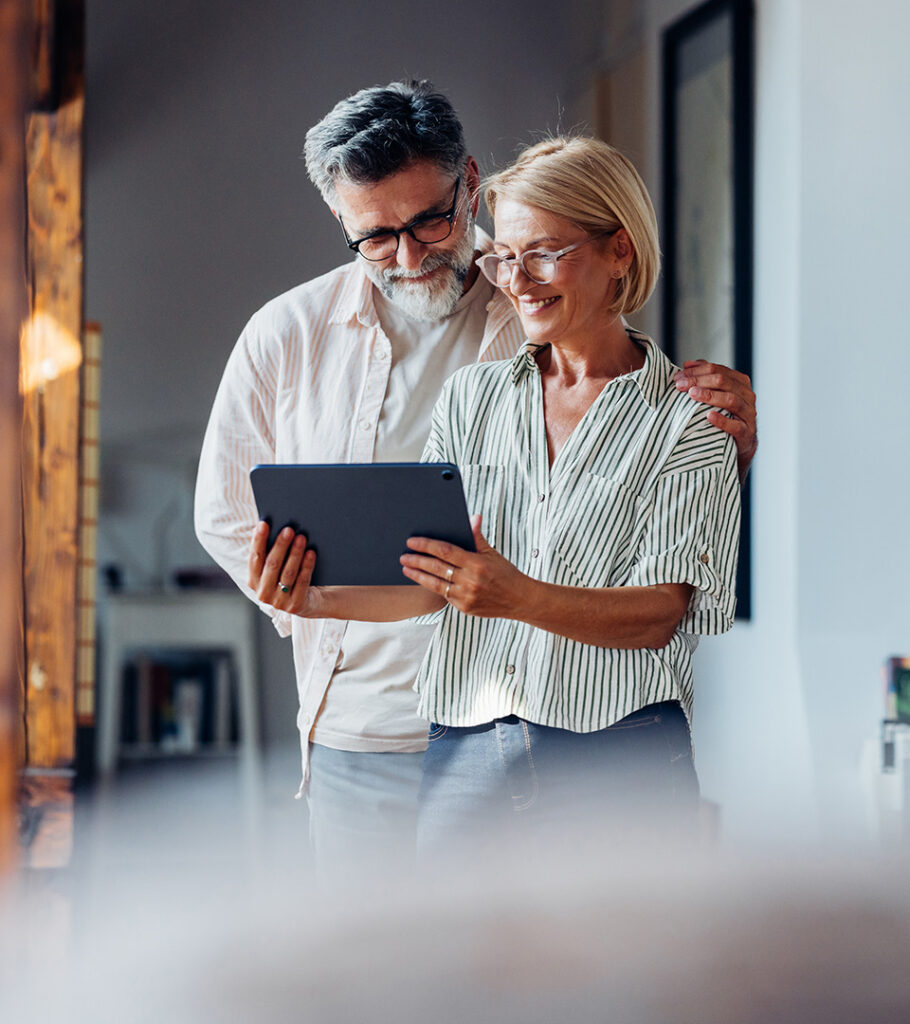 couple looking at ipad
